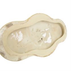 Late 19th century Copeland majolica centrepiece, circa 1874, modelled as two putto standing with fishing net draped between them, their catch spilling onto the quatrelobed base beneath, with impressed mark beneath, H24cm W33cm 