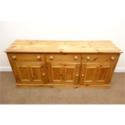  Solid pine dresser base, three drawers above three cupboards, plinth base, W183cm, H82cm, D50cm  