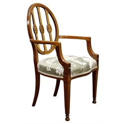  Sheraton style mahogany armchair, inlaid with husks and boxwood stringing, serpentine seat upholstered in floral pattern fabric, square tapering supports with ball feet  
