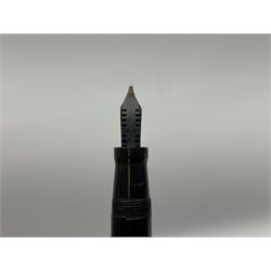 Vintage Swan Mabie Todd lever fill fountain pen in coral red, the nib a/f marked 14K, together with two further vintage Swan Mabie Todd fountain pens, the first example with lever fill, the other leverless, each with black body, one with nib marked 14ct, (3) 