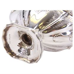 Early 20th century American silver three piece coffee service, comprising coffee pot with ivory insulators to the handle, twin handled sucrier, and cream jug, each of part reeded form chased with foliate swags and bands, each marked for Black, Starr & Frost, New York, also stamped Sterling, Chippendale Exclusive Design, coffee pot H27cm, including handles sucrier H12, including handle cream jug H15.5cm

This item has been registered for sale under Section 10 of the APHA Ivory Act