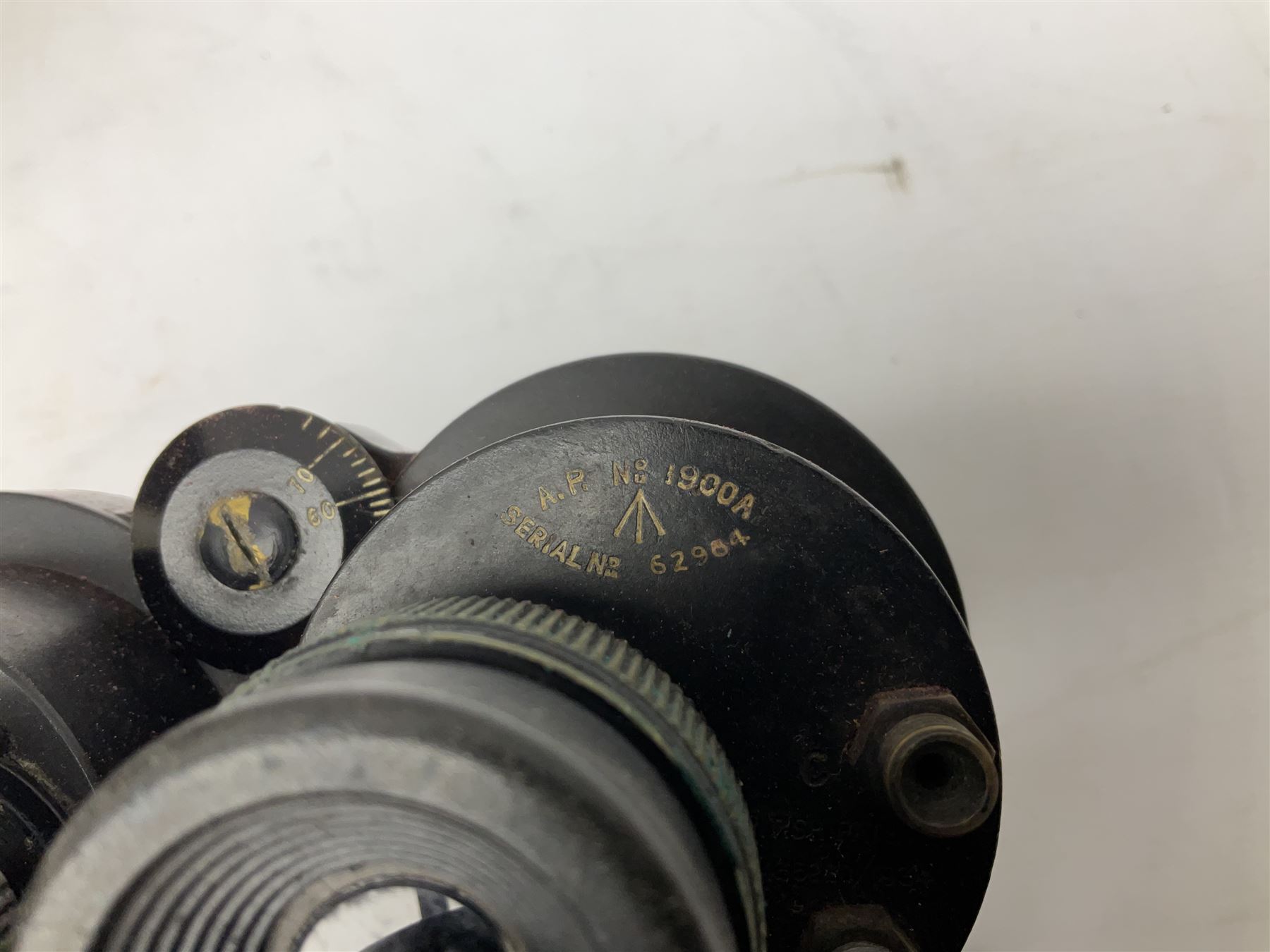 Pair of WWII Barr and Stroud CF41 naval binoculars,  A.P.1900A, with painted broad yellow military arrows, engraved Barr & Stroud, 7X CF 41, Glasgow & London, Serial no. 62984 with leather lens covers and case, H24cm