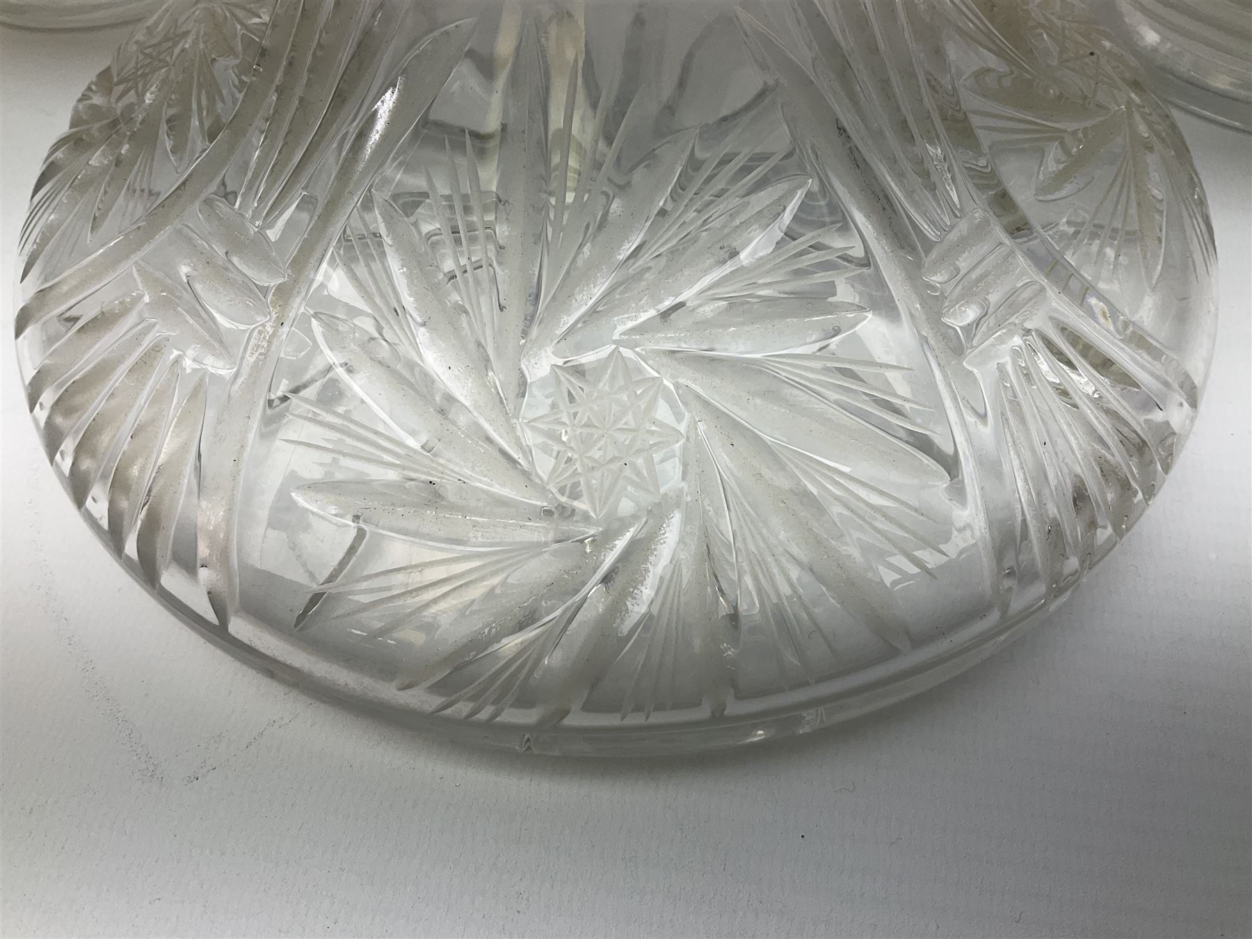 Pair of cut glass decanters and stoppers, together with a cut glass ships decanter and stopper, and pair of claret jugs with star cut decoration to bodies, in one box, (5)