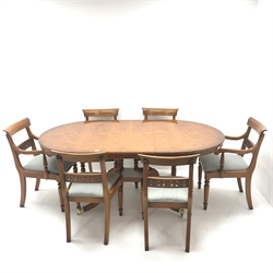  Regency style yew wood twin pedestal extending dining table, single leaf, brass capped hairy paw feet (W186cm, H77cm, D108cm) and set six (4+2) chairs, pierced splat, upholstered seat, turned supports (W53cm)  