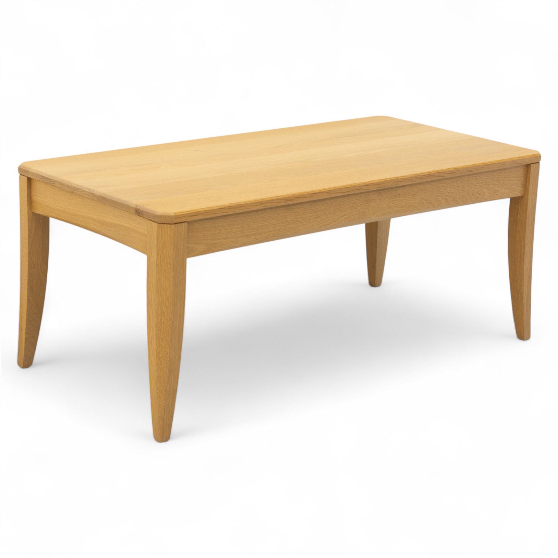 Ercol - light oak ‘Artisan’ coffee table, of rectangular form with chamfered top and gently tapered legs