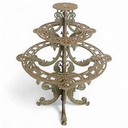 Large Victorian cast iron circular three-tier plant stand, in a weathered condition, circa 1870