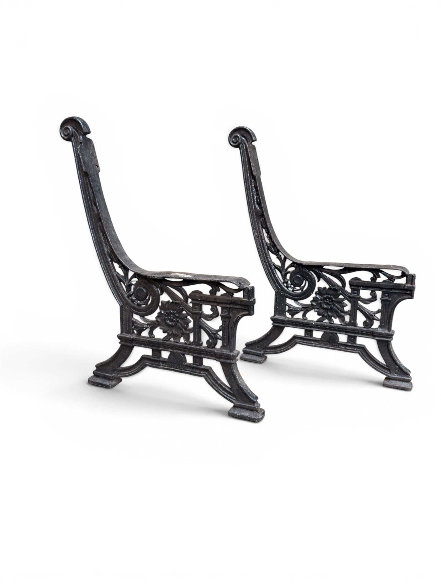 Yates Haywood - pair of Victorian cast iron bench ends, Architectural scrolling design with flower head detail, stamped with period registration number and date