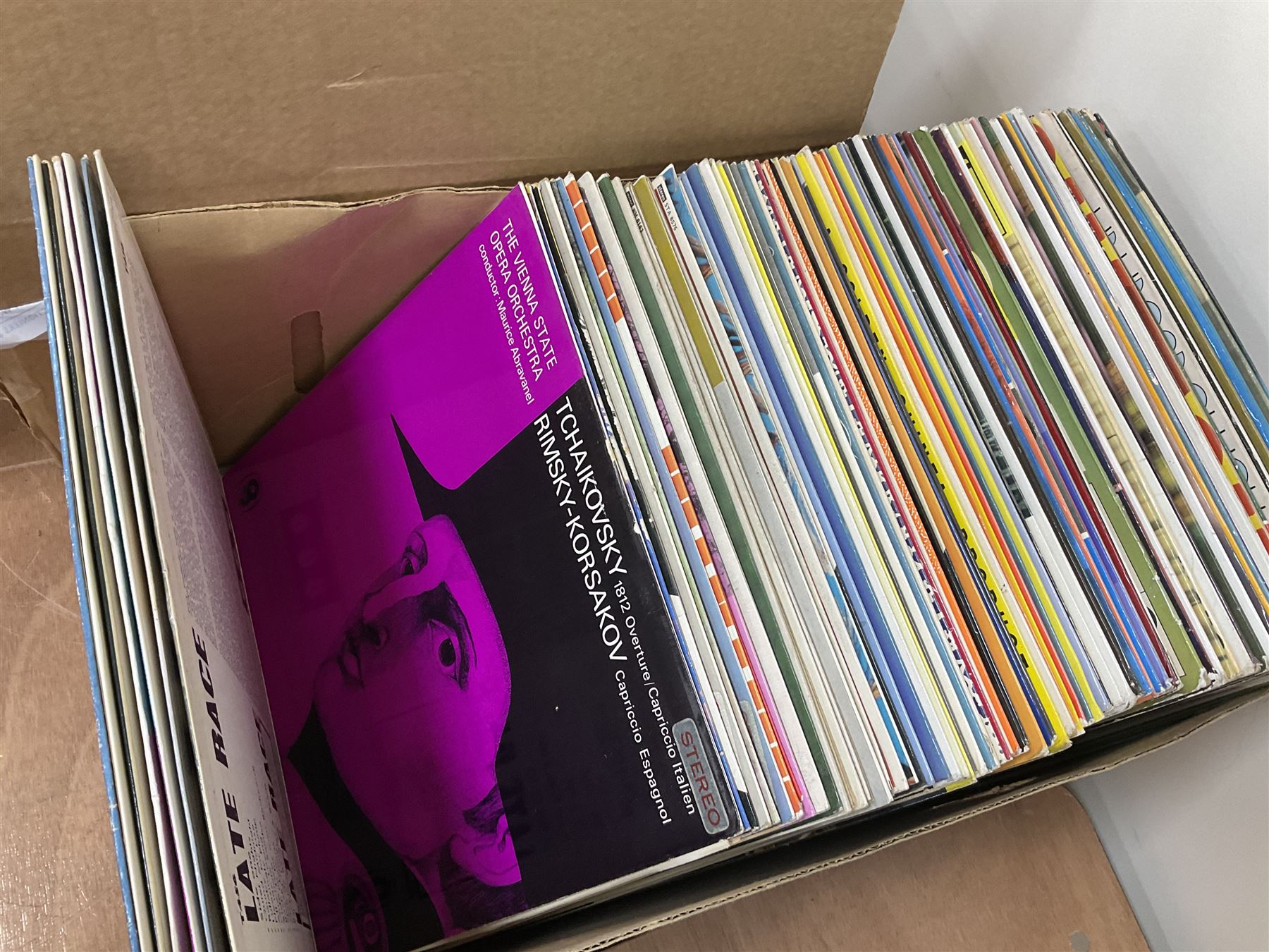 Large quantity of vinyl LPs to include Madonna, ABBA, The Carpenters etc, together with a quantity of 45rpm records, to include approx nine The Beatles The Singles Collection examples etc