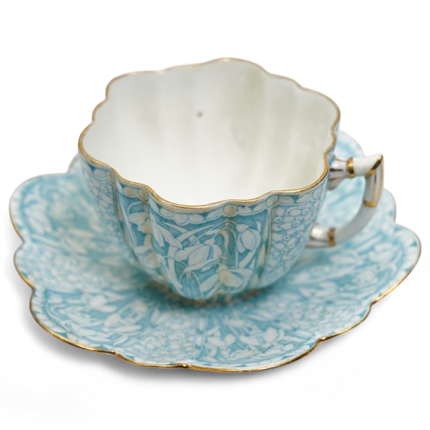 Early 20th century Foley tea service for twelve designed by Charles Wileman, comprising twelve teacups, twelve saucers, eleven side plates, two serving plates and a cream jug