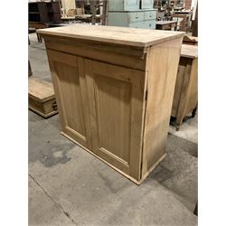 Stripped pine cupboard or bookcase, projecting cornice over two panelled doors, enclosing two shelves - THIS LOT IS TO BE COLLECTED BY APPOINTMENT FROM THE OLD BUFFER DEPOT, MELBOURNE PLACE, SOWERBY, THIRSK, YO7 1QY