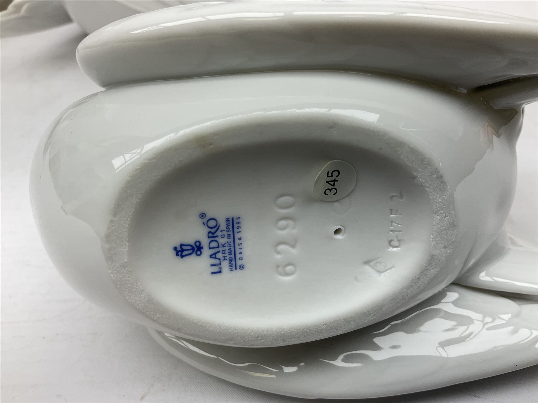 Four Lladro dove figures, comprising Taking Flight no 6288, Dove no 1015, Proud Dove no 6290 and Peaceful Dove no 6289, all with original boxes, largest example H20.5cm 