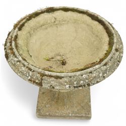 Pair of 20th-century Victorian design cast stone garden urns (2)
