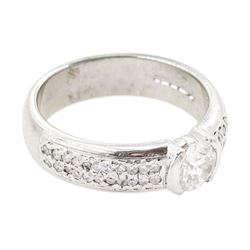 18ct white gold diamond ring, half bezel set with a single round brilliant cut diamond of approx 0.45 carat, with pave set round cut diamond shoulders, hallmarked