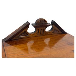 Victorian walnut bedroom suite - wardrobe, dressing chest and bedside cupboard, comprising a full-length wardrobe with broken pediment and central mirrored door, large lower drawer, a matching dressing table with bevelled swing mirror over two trinket drawers and two short drawers over two long drawers, and a single-door bedside cupboard, all with moulded edges, decorative panel work and shaped aprons