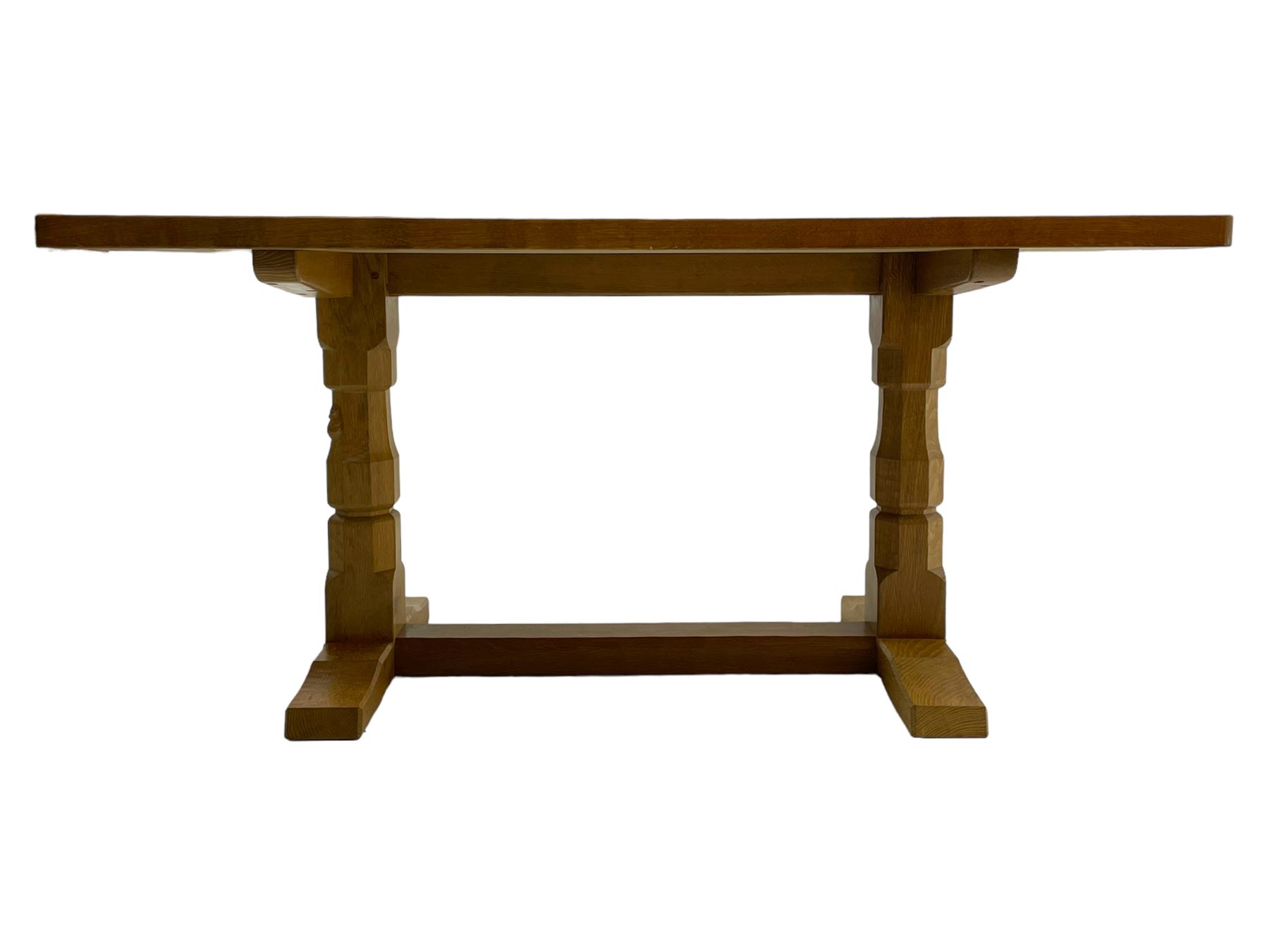 Mouseman - oak dining table, adzed rectangular top on twin octagonal pillar supports, sledge feet united by floor stretcher, by the workshop of Robert Thompson, Kilburn 