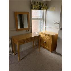 Light oak two drawer side table, light oak cabinet and a wall mirror- LOT SUBJECT TO VAT ON THE HAMMER PRICE - To be collected by appointment from The Ambassador Hotel, 36-38 Esplanade, Scarborough YO11 2AY. ALL GOODS MUST BE REMOVED BY WEDNESDAY 15TH JUNE.