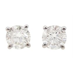 Pair of 18ct white gold round brilliant cut diamond stud earrings, stamped 750, total diamond weight approx 0.80 carat