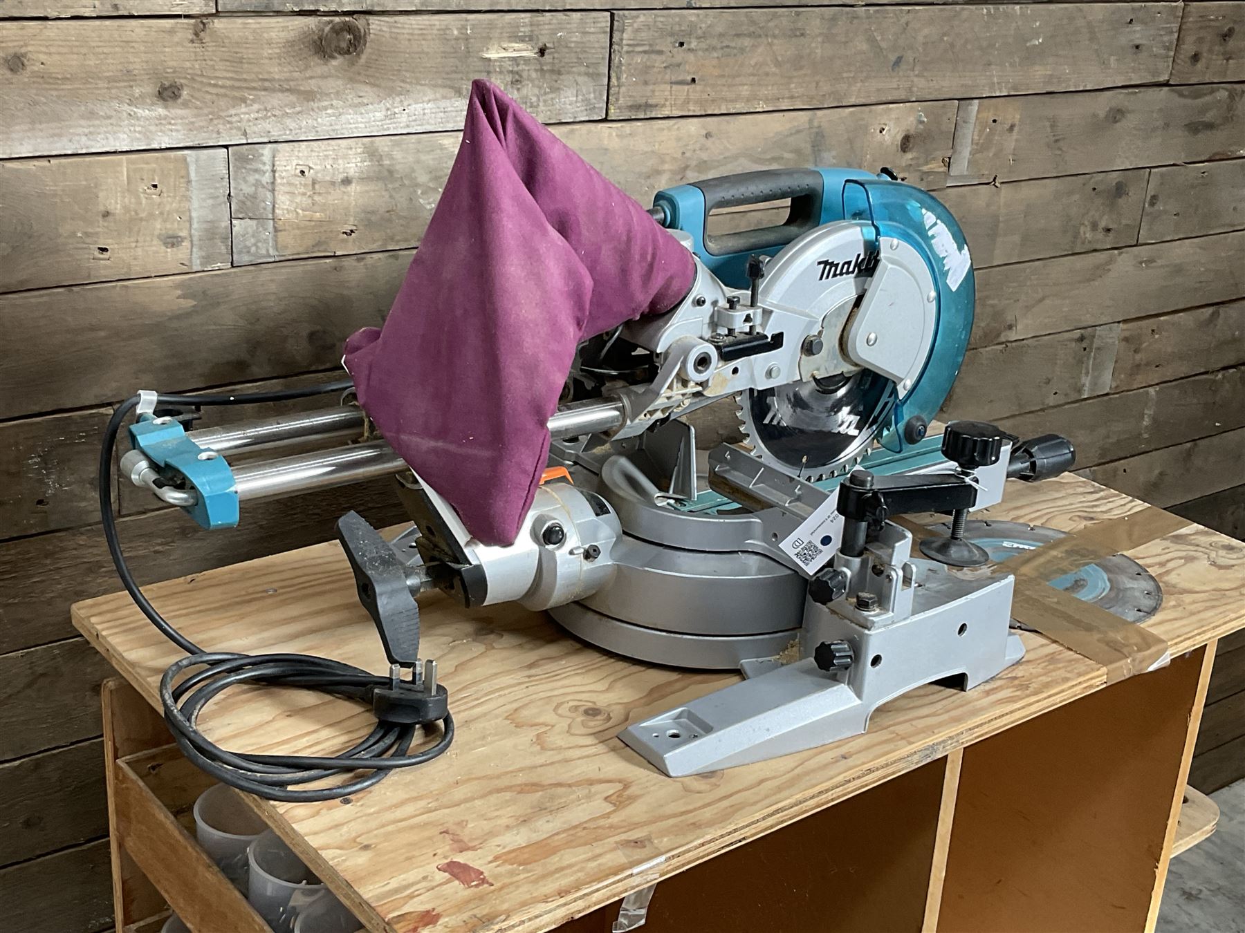 Makita LS0815FL chop saw, with wooden trolley