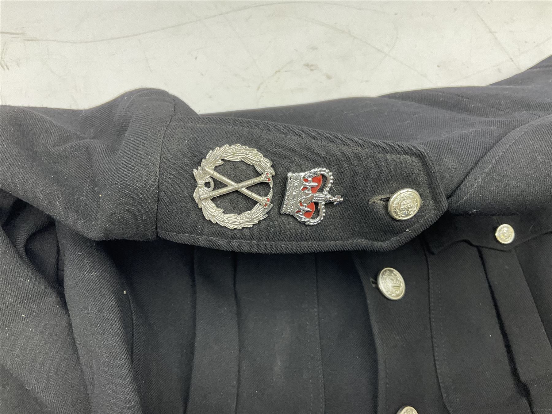 LNER Police cape; indistinctly dated 1943(?); York & North East Yorkshire Police belted tunic; belted tunic with Chief Constable epaulettes and buttons; and another tunic with staybrite Queens Crown buttons (4)