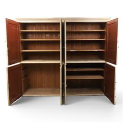 Large Georgian painted pine housekeepers cupboard, projecting cornice with four sets of twin cupboard doors with shelving enclosed