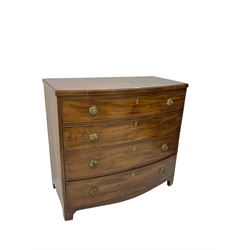 Regency mahogany bow front chest, the top with ebony and satinwood stringing, fitted with four cockbeaded drawers with brass pull handles and bone escutcheons, on bracket feet