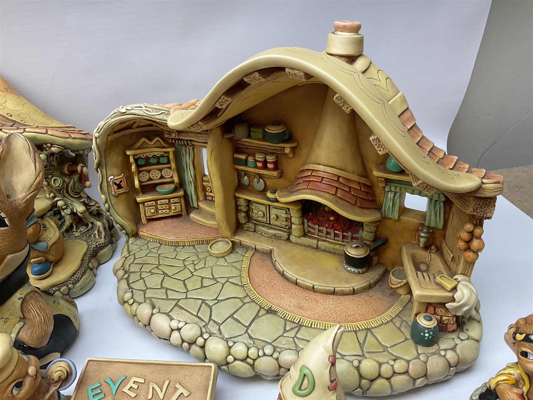 Extensive collection of Pendelfin rabbits and stands, to include Betsy Barge, Fruit Shop, Uncle Soames, Event Piece etc, many with original boxes 