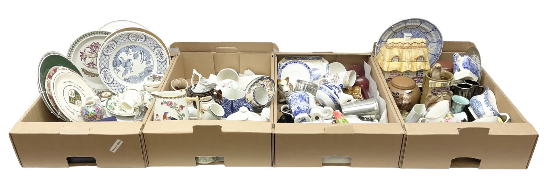 Quantity of various ceramics and glassware to include pair of Disney Mickey and Minnie Mouse cowboy Sherriff figures, stamped Japan beneath, Mason's ironstone, Wedgwood, Portmeirion, tea and dinner wares, collectors plates, glass animals etc in four boxes