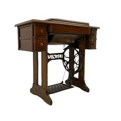 Singer treadle sewing machine, oak case