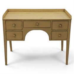 Pine country writing desk, rustic cream paint finish, galleried top over a central drawer flanked by two drawers, tapered square supports