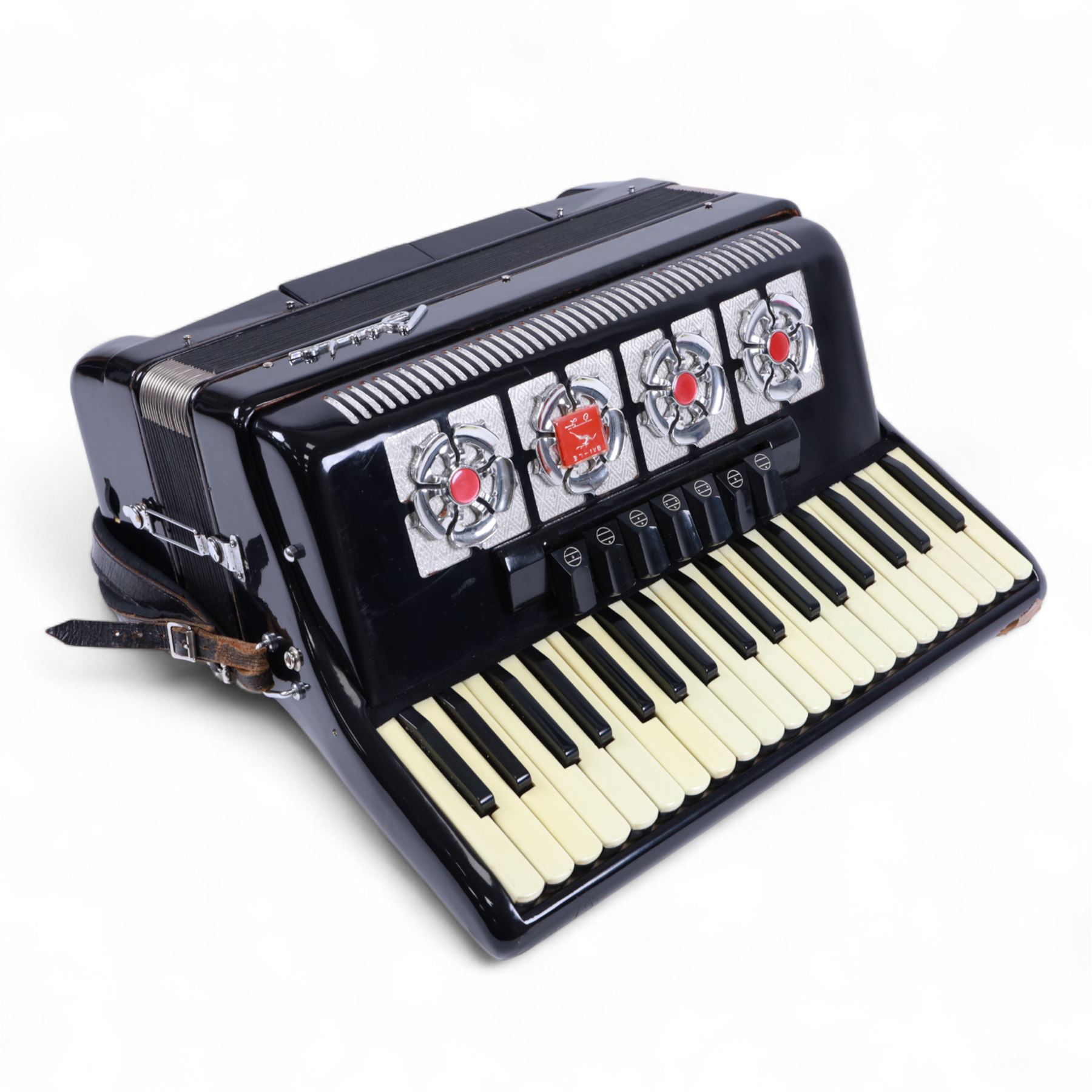 Bai-Le-20th century Chinese Piano Accordion, three octave keyboard with 96 treble buttons and 7 base keys, 16-fold bellows with shoulder straps and hard carrying case.