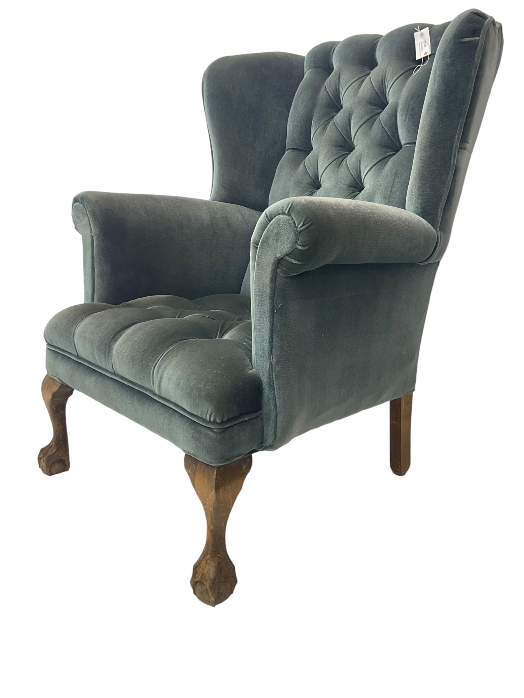 Georgian design wingback armchair, traditional shape with rolled arms, upholstered in teal velvet fabric, on cabriole supports with ball and claw feet