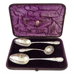 Pair of George IV silver strawberry spoons by Adam Elder, Edinburgh 1829, with later bright cut decoration and a matched Victorian sifter Edinburgh 1864, approx 5.3oz, retailed by Arnold & Lewis, Manchester cased