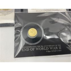 Eleven Queen Elizabeth II miniature gold coins, each being 0.5 grams of 24 carat gold, including Tristan da Cunha 2020 'Laurel', Solomon Islands 2020 '80th Anniversary of the Battle of Britain' etc, all with certificates