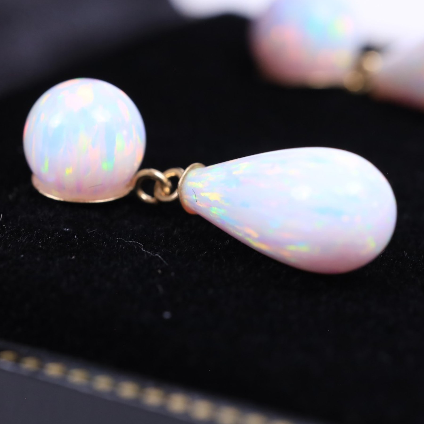 Pair of 9ct gold opal pendant earrings, boxed