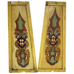 Two early 20th century fairground 'Chair-O-Plane' panels, wooden framed with sheet metal panels, painted in yellow with scrolled cartouche decoration in red, gold and green