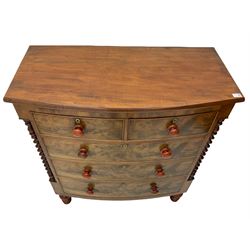 Victorian mahogany bow front chest, fitted with two short and three long drawers, turned barley twist pilasters