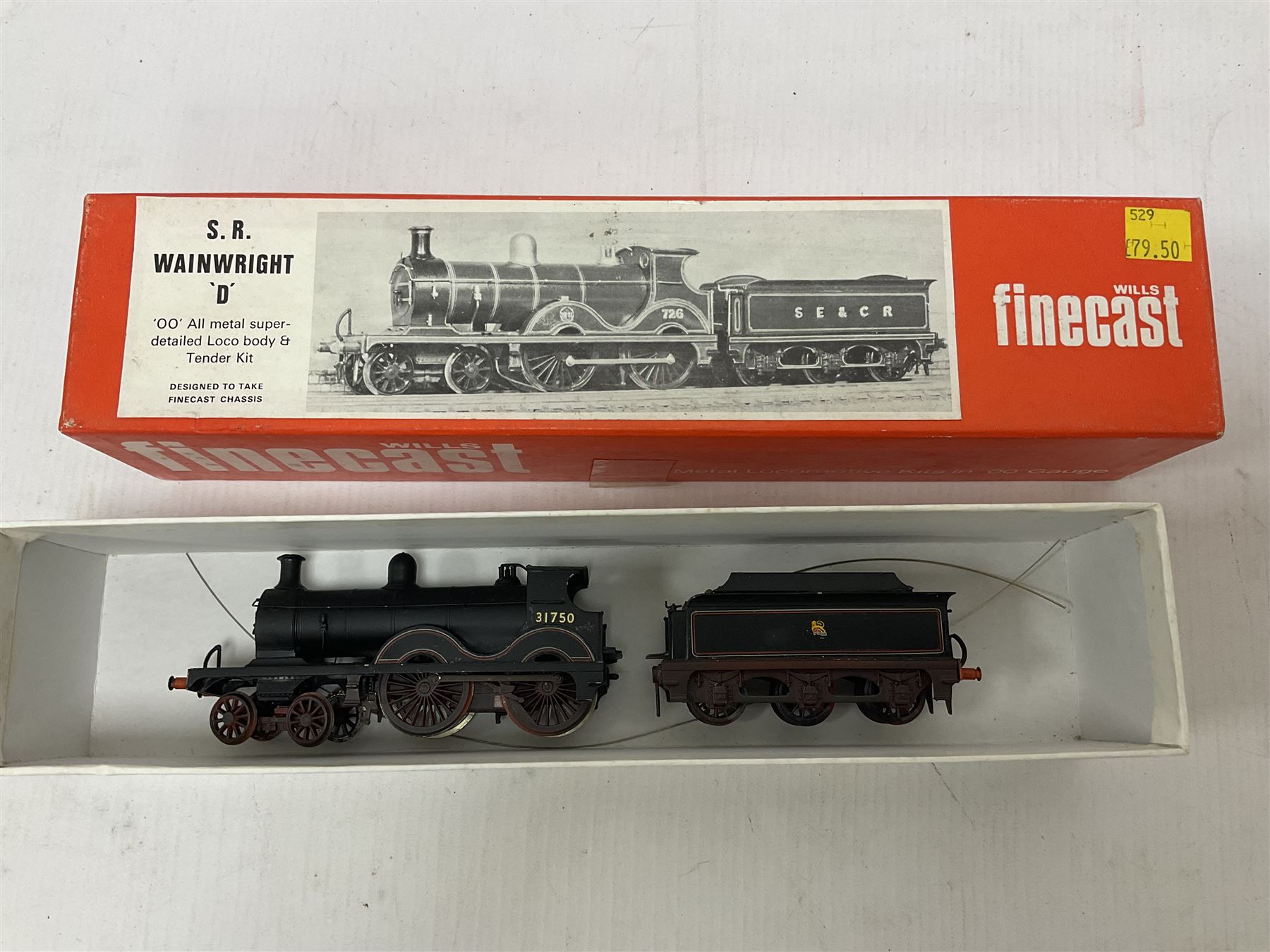‘00’ gauge - two kit built locomotive and tenders comprising SR Wainwright Class C 4-4-0 no.115 finished in SE&CR green; SR Wainwright Class D 4-4-0 no.31750 finished in BR black; both with Wills Finecast boxes (2) 