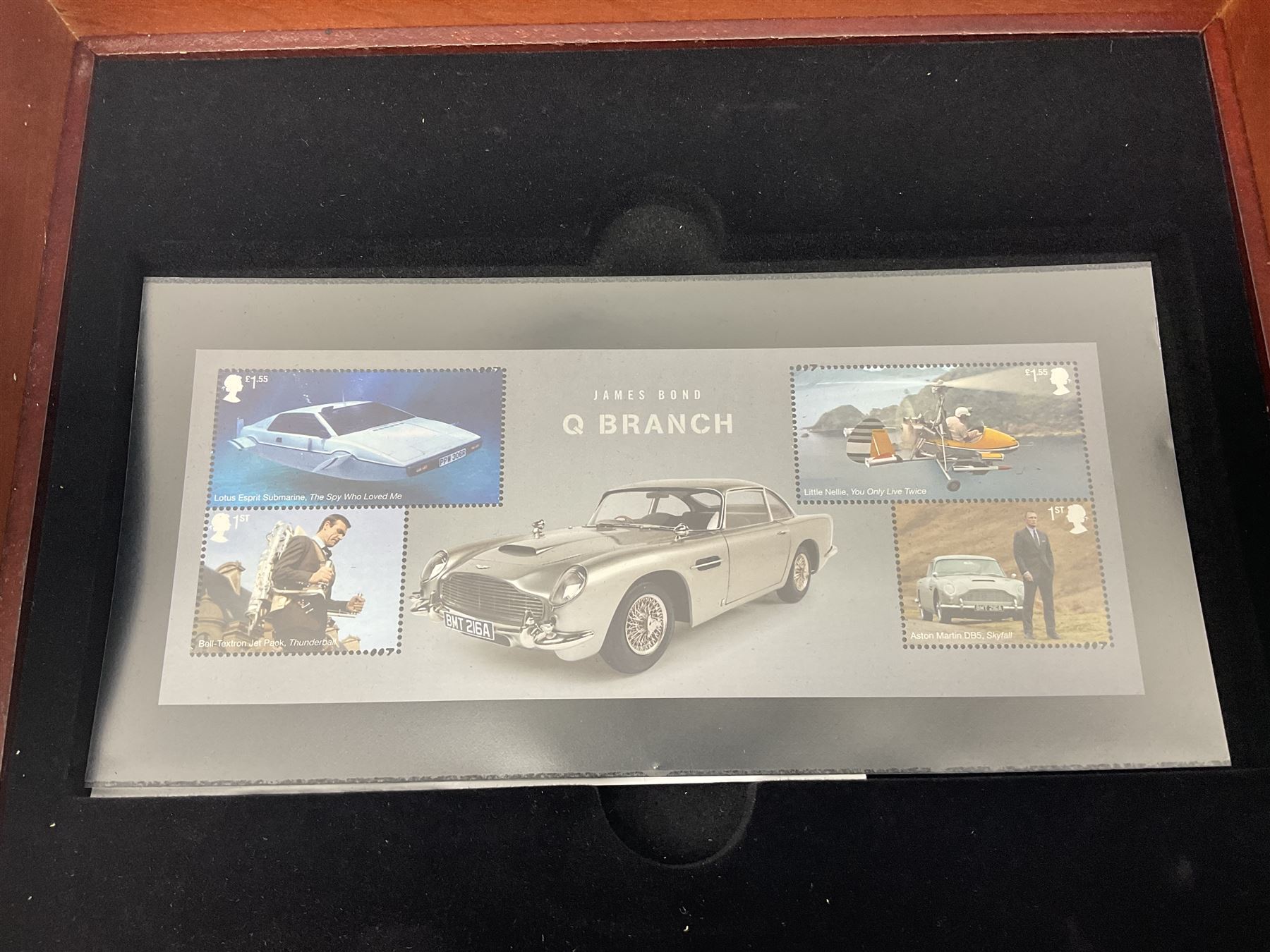 Danbury Mint 'The Ultimate James Bond Collection' comprising stamps and coins housed in a display case, 'Concorde Queen of the Skies' sculpture, stamps, medallion display and 2020 'Centenary of the Unknown Warrior' five pound coin cover in Harrington and Byrne folder