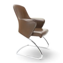 Set of four contemporary Senator executive cantilever chairs, upholstered in Padova hide, moulded back and integrated armrests, raised on a tubular chromed cantilever base