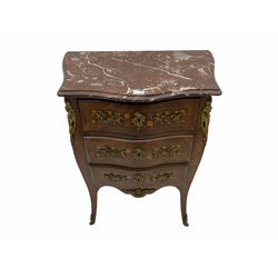 Early 20th century French rosewood bomb chest, the moulded serpentine rouge marble top over three drawers with inlay, gilt metal mounts 