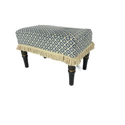 Late 19th century Aesthetic movement ebonised footstool, stuffed seat with blue and white patterned cover with fringing, turned and gilt carved supports 