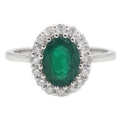 White gold oval emerald and round brilliant cut diamond ring, stamped 18K, emerald approx 1.30 carat