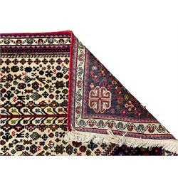 Persian Abadeh indigo ground runner rug, ivory field with pole medallion surrounded by plant and bird motifs and contrasting spandrels, border with interlaced flowerheads