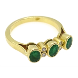  Gold three stone emerald and four stone diamond ring, stamped K18  