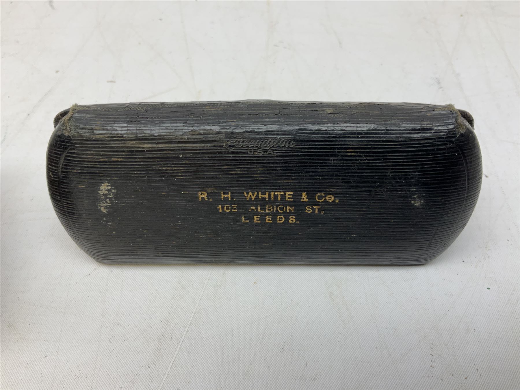 20th century Coronet Midget 16mm camera, in marbled brown Bakelite case with chrome mounts, L6cm, together with a pair of 9ct gold (tested) spectacles in case