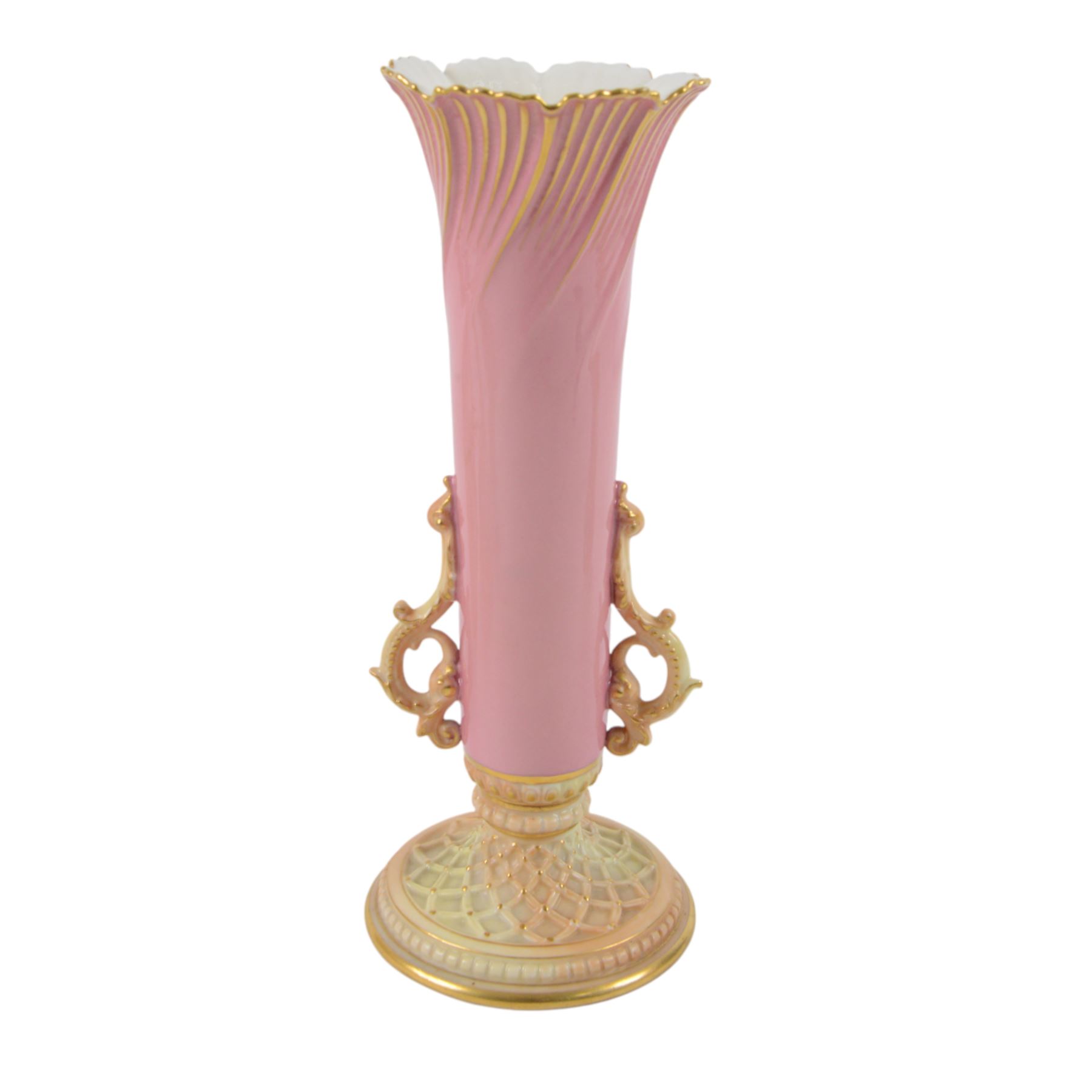 Royal Worcester Blush Ivory, comprising reticulated pot pourri jar upon eagle support, with black printed mark beneath, twin handled posy vase, shape no. 1556 with pink fluted body and puce mark beneath and three jugs, including shape no. 1018 example with bird mounted handle and two shape 1094 examples, all decorated with floral sprigs and with puce marks beneath, tallest H21cmn