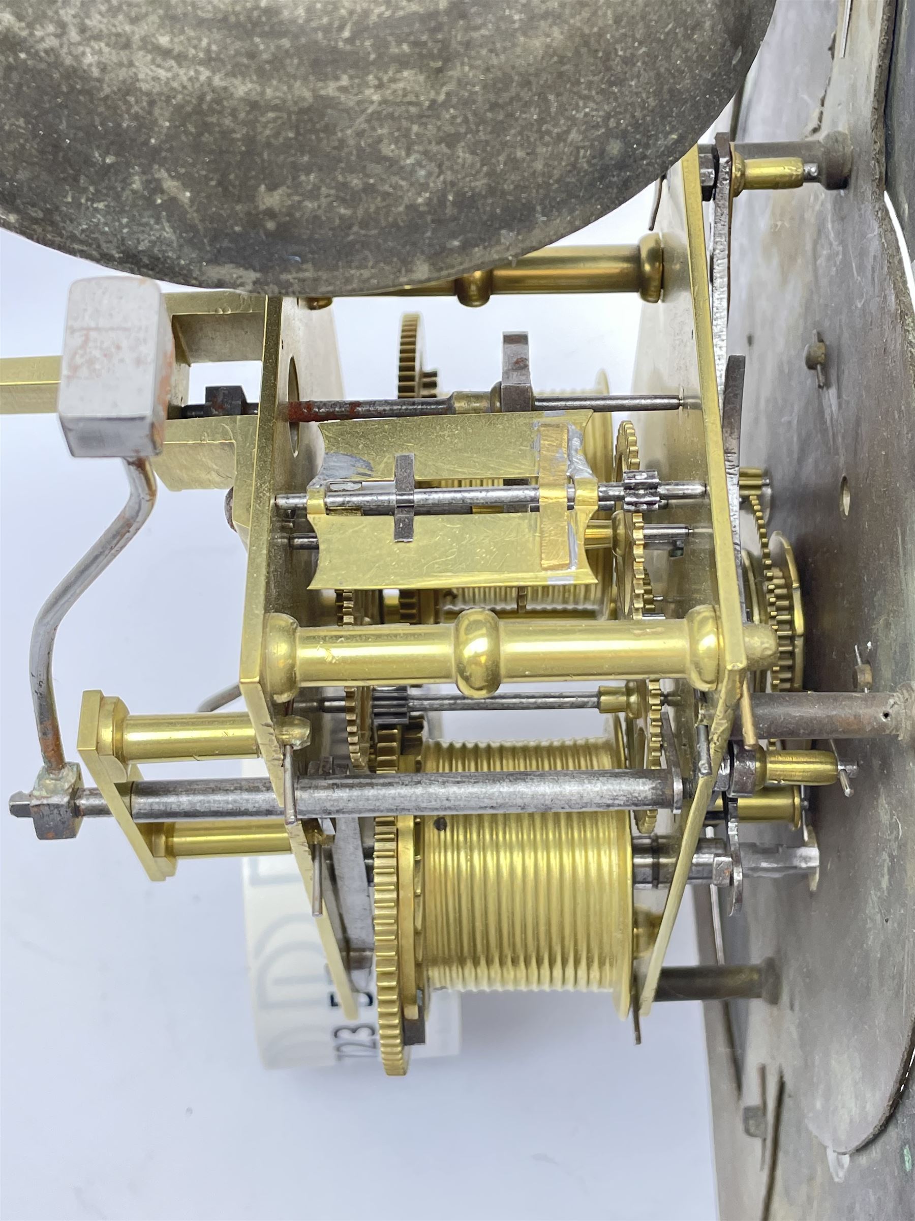 Late 18th century clock movement and dial, square brass dial with Arabic and Roman chapter ring signed 'Thos. (Thomas) Johnston, Dublin', with subsidiary seconds dial and calendar aperture, the dial set with ornate mask cast spandrels, twin train eight day movement striking on bell, with anchor escapement (34.5cm x 34.5cm, 13 1/2