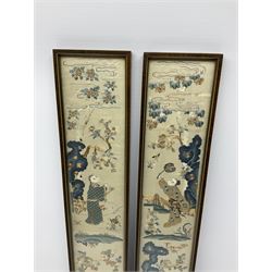 A pair of Japanese silk work panels, depicting figures within a landscape with blossoming trees, fences and rivers, including frame H57.5cm L10.5cm.