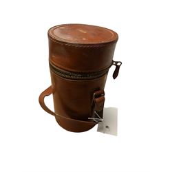 Set of three curved glass flasks with EPNS collars and lids, contained within a hide case with gilt initials