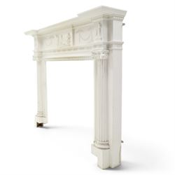 Large Adam's design white painted Neoclassical fire surround, the frieze moulded with goddess and cherubic motifs with bellflower festoons, egg-and-dart moulded inner slip flanked by Ionic capitals on classical columns